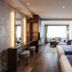 Kitayuzawa Mori no Soraniwa room in Date with twin beds, vanity, seating area and large window