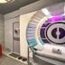 Astrotel Cubao in Quezon City, futuristic themed room with circular bed alcove and bold red chair