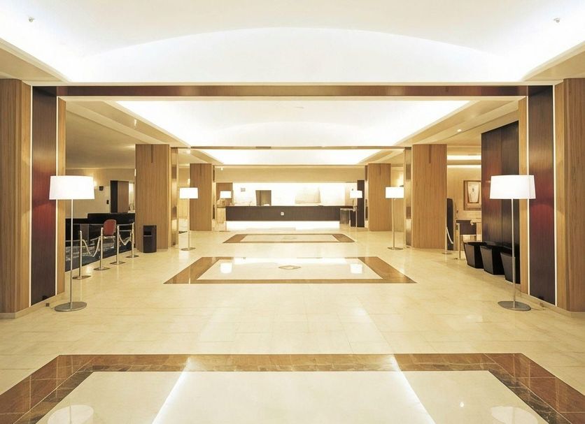 Kakogawa Plaza Hotel lobby in Kakogawa with bright modern reception area and polished tile floor