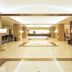 Kakogawa Plaza Hotel lobby in Kakogawa with bright modern reception area and polished tile floor