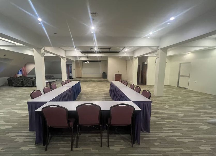 Iris House Hotel Cameron Highlands in Brinchang meeting room with U-shaped conference tables and chairs