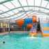Blue Lake Holiday Park in Mount Gambier indoor pool with orange and blue waterslides
