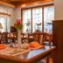 Hotel Elbinsel Hamburg dining room with set wooden tables and large windows