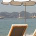 Five Seas by Inwood Hotels in Cannes with sun loungers overlooking the sea and distant mountains