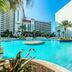 Laketown Wharf 1712 in Panama City Beach with a large outdoor pool and palm trees