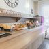 Appart'City Confort Perpignan Centre Gare breakfast buffet with pastries and coffee station
