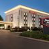 Hampton Inn Birmingham/Trussville in Trussville exterior at dusk with covered entrance and illuminated sign