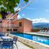Hotel Restaurante La Glorieta in La Seu d'Urgell, outdoor pool with lounge chairs and mountain views