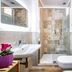 B&B Lorenzo de' Medici Florence bathroom with walk-in glass shower, wall-mounted toilet and sink