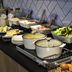 ibis Paris Tour Montparnasse 15ème breakfast buffet with hot dishes, salads and bread in Paris
