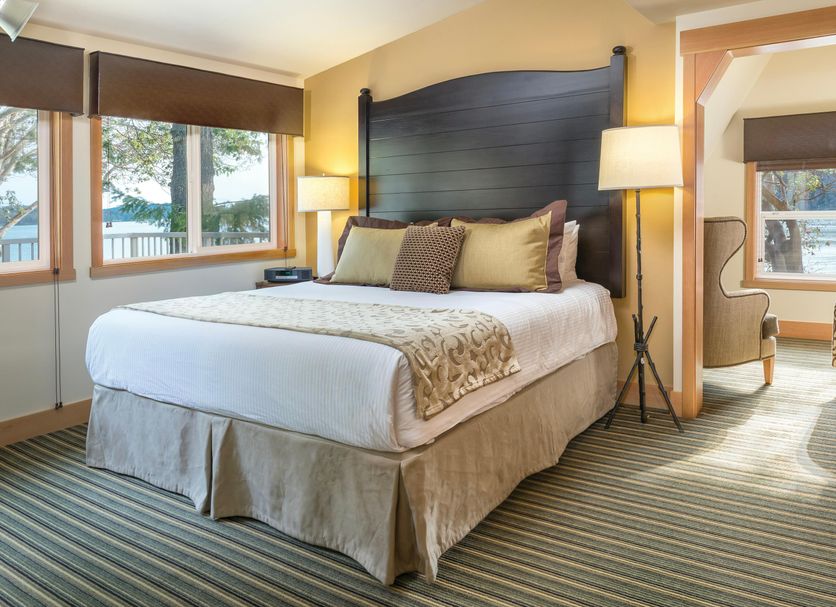 Worldmark Deer Harbor guest room with king bed, windows, and water view in Deer Harbor