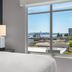 Hyatt House Emeryville/San Francisco Bay Area guest room with bay and city view through large window
