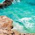 Sea of Cortez Beach Club in San Carlos with turquoise ocean water and rocky shoreline