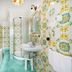 Locanda Degli Agrumi bathroom with bathtub, shower, sink and colorful patterned tile in Conca Dei Marini