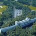 Hakodate-Onuma Prince Hotel in Nanae, aerial view of long hotel surrounded by forest and golf course