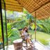 Asita Eco Resort Samut Songkhram riverside pavilion with palm trees and canal view