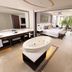 Royalton Riviera Cancun suite with whirlpool tub, double vanity and balcony view in Puerto Morelos