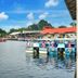 Quayside Hotel Malacca waterfront view with boats docked along the river