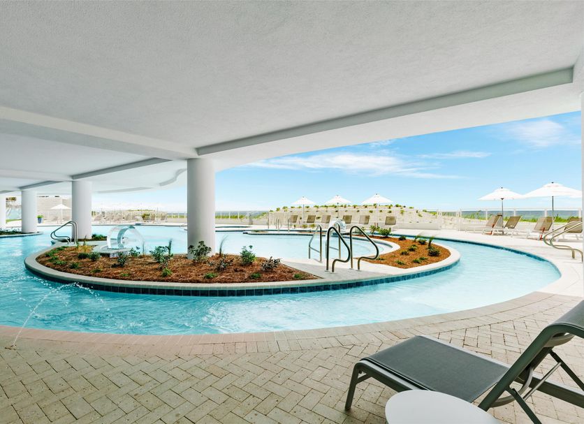 Hyatt Place Panama City Beach/Beachfront pool with ocean view and lounge chairs in Panama City Beach