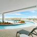 Hyatt Place Panama City Beach/Beachfront pool with ocean view and lounge chairs in Panama City Beach
