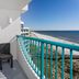 Holiday Inn Express Pensacola Beach balcony with chairs and ocean view