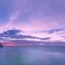 Conrad Bora Bora Nui in Vaitape with overwater villas and a calm lagoon at sunset