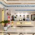 OYO Hexi Hotel lobby in Zhangye with front desk, decorative lighting, and potted plants