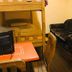 Hotel Savoy La Paz room with bunk bed, black loveseat, desk and chair