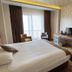 Sor Hotel Eskisehir guest room with king bed, TV, desk, and window seating in Eskişehir