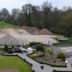 Hotel Bemelmans in Schin op Geul: landscaped garden with winding paths, pond, and open grounds