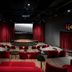 Pierdrei Hotel Hafencity Hamburg in Hamburg features a small theater-style event room with red seating