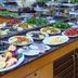 Marlight Boutique Hotel in Izmir buffet spread with salads, fruit, and plated breakfast dishes