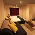 Hotel Pagoda Nara guest room with bed, sofa, low table and raised seating area