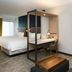 SpringHill Suites by Marriott Seattle Issaquah guest room with bed, desk, and seating area