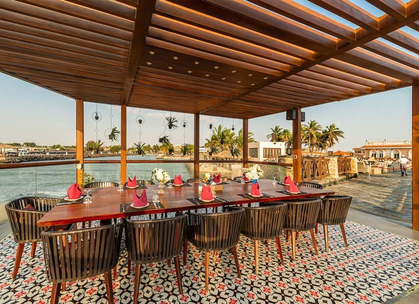 Narcissus Obhur Resort & Spa in Jeddah, open-air waterfront dining terrace with patterned tile floor