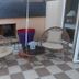 Chambre d'hôtes Au Nid du Thil in Beauvais, small terrace with wicker chairs and a glass-topped table