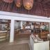 The Beach Tulum Hotel in Tulum lounge with wicker pendant lights and open-air seating