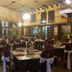 Hotel Temático Mision Colonial restaurant with set tables and balcony seating in San Cristóbal de las Casas