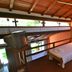 Pousada Da Ferradura in Búzios, loft-style room with two single beds and wood ceiling