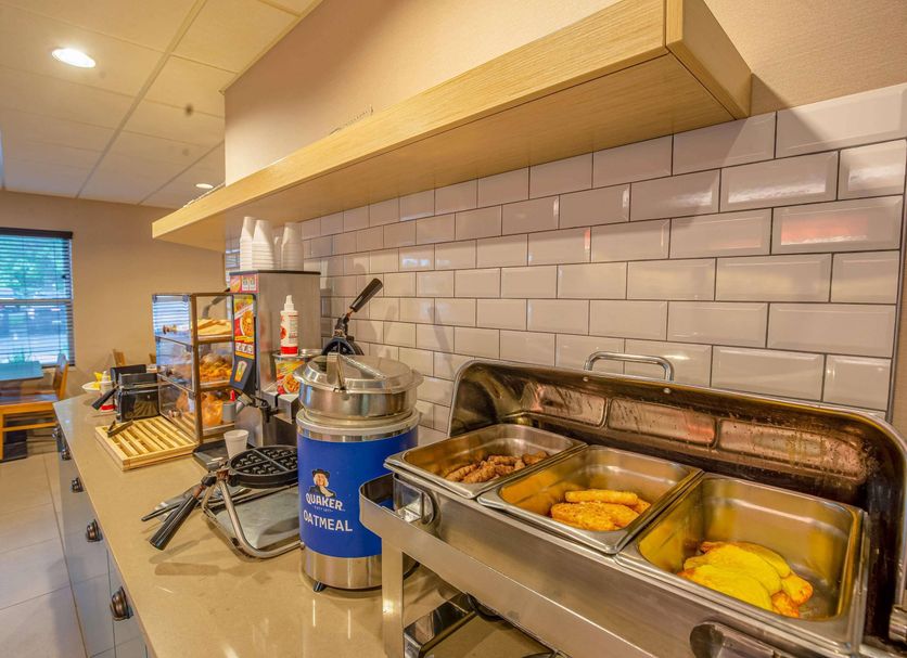 Country Inn & Suites by Radisson, Crystal Lake, IL breakfast buffet with hot food and coffee station