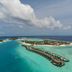 Hard Rock Hotel Maldives in Malé with overwater villas on a turquoise lagoon and ocean views