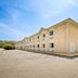 Lakewood Inn & Suites in Dowagiac, exterior view of the two-story hotel building and parking lot