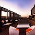 Royal Orchid Central Jaipur, Bani Park rooftop lounge with sunset city view and seating