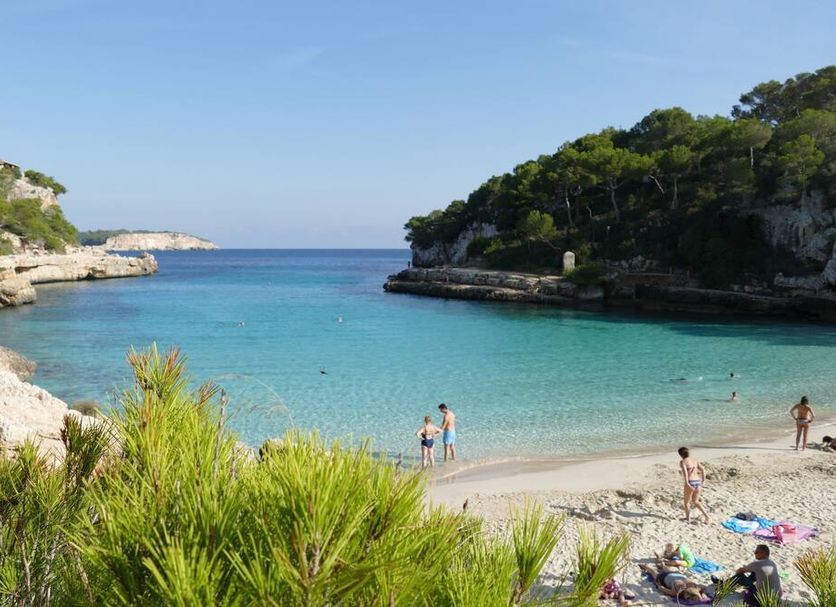 Finca Sa Carrotja in Ses Salines with a turquoise cove beach and rocky cliffs