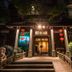 Grand Pacific Hotel Ningbo entrance in Ningbo with red lanterns, stone lions, and lit steps at night