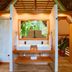 Shawandha Ecolodge in Puerto Viejo de Talamanca bathroom with double sinks and open-air tropical view