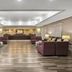 La Quinta Inn & Suites By Wyndham Dfw Airport South Irving lobby with seating area and front desk