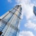 Pod Inn Shanghai Lujiazui in Shanghai, two skyscrapers rising against a blue sky