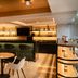 Hilton Garden Inn Mexico City Polanco bar lounge with seating and illuminated shelves in Mexico City