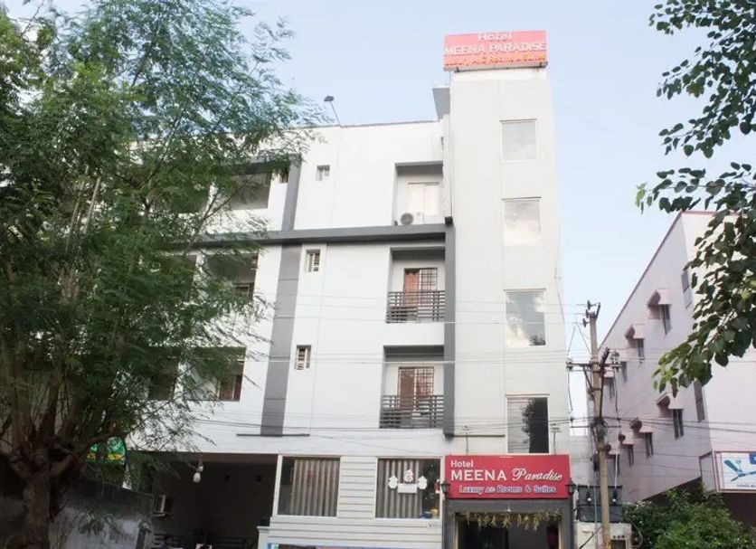 Hotel Meena Paradise in Visakhapatnam, exterior view of the white multi-story hotel building